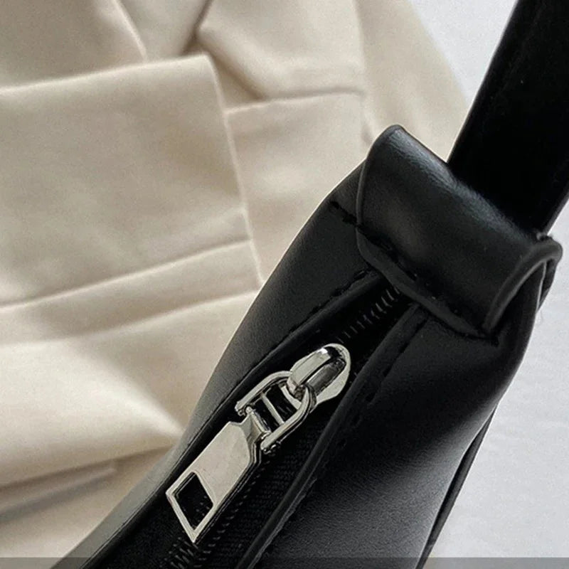 Soho Vegan Leather Clutch Bag